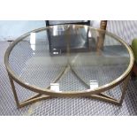 LOW TABLE, Hollywood Regency style, gilt with bevelled glass top, 100cm diam x 40cm H.