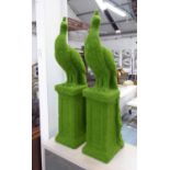 FAUX GRASS PEACOCKS, a pair, 100cm H.