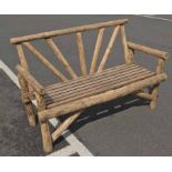 SCOTTISH GARDEN ESTATE BENCH, early 20th century naturalistic pine,