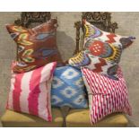 RIFAT IKAT SILK CUSHIONS, group of five, various designs.