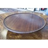 LAZY SUSAN, 19th century mahogany 46cm diam x 10.5cm H.