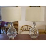 TABLE LAMPS, a pair, glass of vase form with white fabric shades, 67cm H x 40cm W.