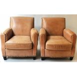 CLUB ARMCHAIRS, a pair, studded buckskin leather each with rounded back and seat cushion, 82cm W.