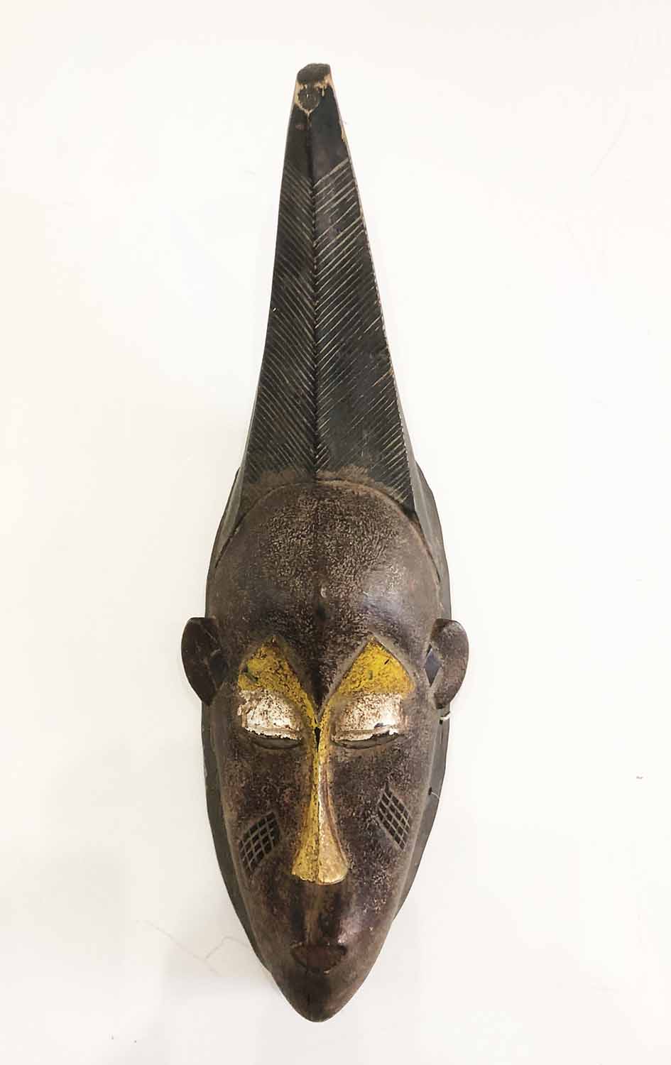 AFRICAN MASK, possibly Yoruba painted and carved wood, 59cm H.
