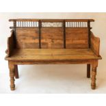 VERANDAH SETTEE, early 20th century Colonial hardwood with iron insert back and plank seat, 130cm W.