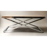 EICHOLTZ STYLE LOW TABLE, rectangular travertine marble raised on X frame chrome supports,