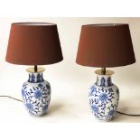 TABLE LAMPS, a pair, blue and white, Chinese ceramic vase form, with shades, 60cm H.