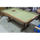 RILEY SNOOKER DINING TABLE, circa 1920, Jacobean style, oak, includes balls and table levellers,