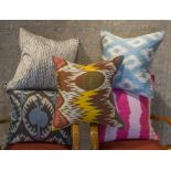 RIFAT IKAT SILK CUSHIONS, group of five, assorted designs.