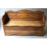HALL BENCH, vintage planked pine, with arms and rising lid, 134cm W.