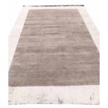 CONTEMPORARY WOOL AND SILK CONTEMPORARY CARPET, 295cm x 195cm.