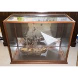 MODEL SHIP, in a large glazed display case, 90cm W x 45cm D x 72cm H.