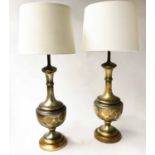 LAMPS, a pair, vase form silver gilt and leaf decorated with shades,