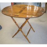 BUTLERS TRAY, Victorian, mahogany, with elliptical hinged sides on folding birch stand,