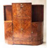 COCKTAIL CABINET, Art Deco, burr walnut and chrome mounted, rising lid revealing mirror, wine,