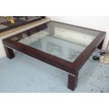 LOW TABLE, of large proportions with a glass top, 150cm W x 150cm D x 42cm H.