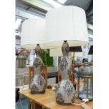 TABLE LAMPS, a pair, patterned eartenware, overall each 90cm H including shades.
