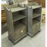 OPEN BOOKCASES, a pair, Georgian style grey painted with shelves above two drawers,