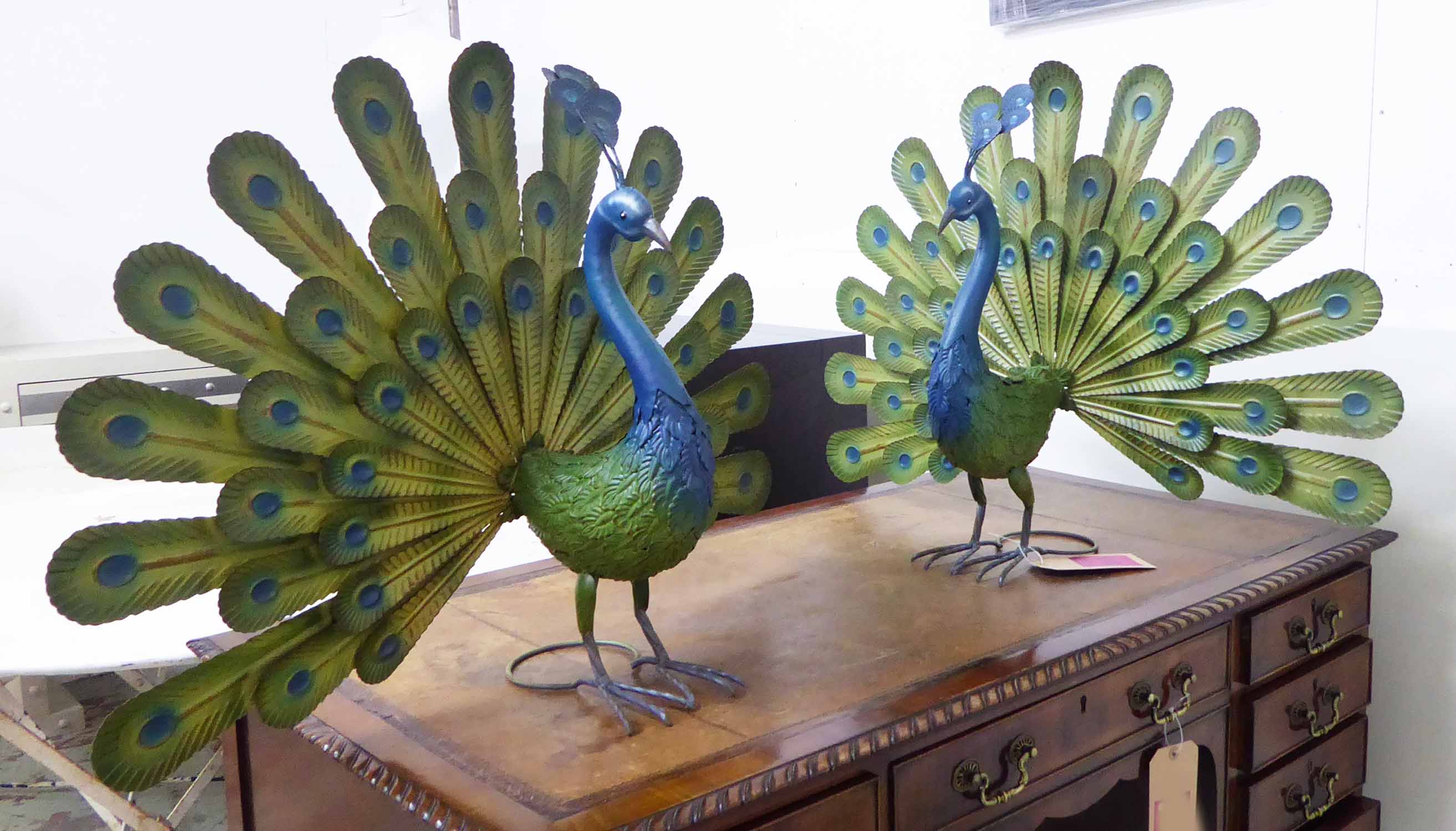 PEACOCKS, a pair, stylised polychrome finish, 57cm H.