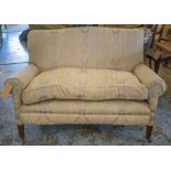 HOWARD & SONS SOFA, early 20th century mahogany, of compact proportions,