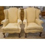 WING ARMCHAIRS, a pair, Georgian style, in cream damask, 112cm H x 86cm W.