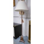 STANDARD LAMP, the reeded silvered column on a triform base with a cream shade, overall 170cm H.