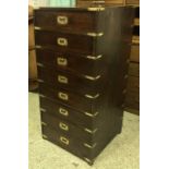 CAMPAIGN STYLE NARROW CHEST, teak and brass with eight short drawers, 107cm H x 50cm x 50cm.