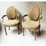 ARMCHAIRS, a pair, George III period painted and gilded with padded oval backs,