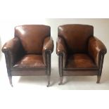 EDWARDIAN CLUB ARMCHAIRS, a pair, mahogany with brass studded hand dyed faded brown leather, 72cm W.