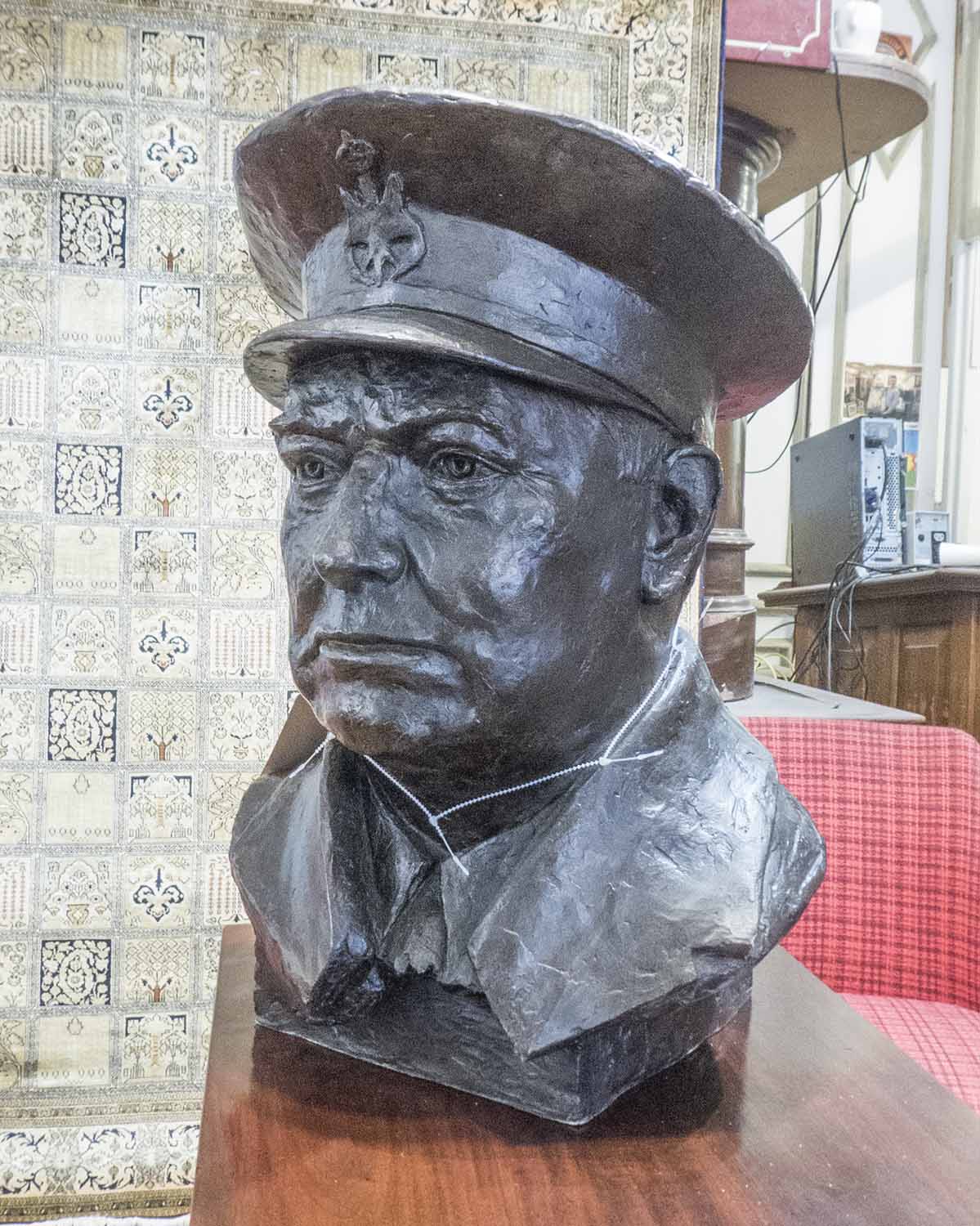 BUST OF CHURCHILL, indistinctly signed, faux bronze finish, 54cm H.