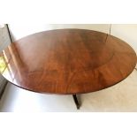 DINING TABLE, Regency style figured mahogany,