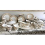 DINNER SERVICE, English fine bone china, Royal Doulton 'Sovereign'.12 place, 8 piece setting.