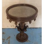 SIDE TABLE, Indian hardwood, the circular carved top on base with floral detail, 49cm W x 68cm H.