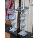 GARDEN CANDELABRAS, a pair, zinc of substantial proportions, each 91cm H x 39cm W.