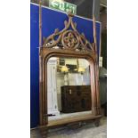 WALL MIRROR, Gothic revival antique oak frame with ornate pediment flanked by spires,