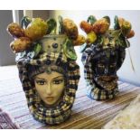 CALTAGIRONE MAIOLICA VASES, a pair, in form of a Moorish man and woman, signed at base, 30cm H.