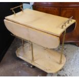 COCKTAIL TROLLEY, 1950's Italian faux parchment top with gilt handles, fold out sides,