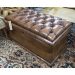 OTTOMAN, Victorian rosewood with a rising lid re-upholstered in buttoned brown leather,
