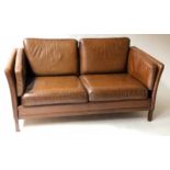 DANISH SOFA, 1970's Danish compact two seater hand finished in mid brown leather, 150cm W.