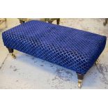 HEARTH STOOL, rectangular in navy blue patterned chenille on brass castors, 32cm H x 93cm x 52cm.