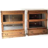 GLOBE WERNICKE BOOKCASES, a pair, Edwardian premium oak with dentil moulding, bowed outline,