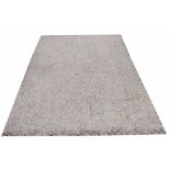 CARPET, contemporary in a thick knotted pebble design, 244cm x 171cm.