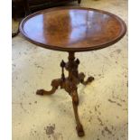WINE TABLE, Victorian walnut on a carved triform base, 51cm W x 64cm H.