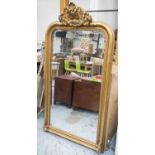 WALL MIRROR, Napoleon III style gilt framed with palmette crest, 169cm H x 90cm W.