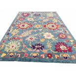 FINE BOULO OUSHAK CARPET, 298cm x 223cm, duck egg blue stylised palmette and vine field.