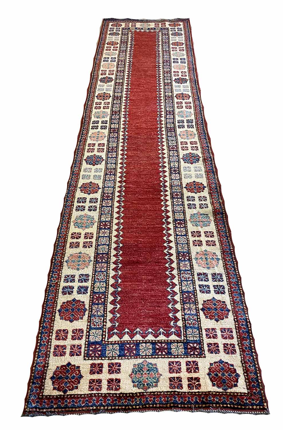 KAZAK RUNNER, 360cm x 90cm, open field within geometric bands and borders.