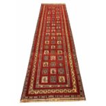 FINE PERSIAN QASHQAI RUNNER, 308cm x 84cm, repeat square medallions within matching borders.