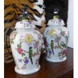 TABLE LAMPS, a pair, with tropical bird and flora detail, 50cm H.