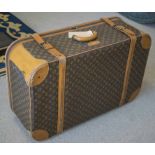 LOUIS VUITTON SUITCASE, bears name label Ann, 53cm x 83cm x 29cm.