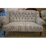 SOFA, Victorian mahogany in ticking fabric, 156cm W. (fault to back castor) 156cm W.